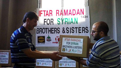 Pembagian sembako di wilayah ini dilakukan secara tertutup untuk keamanan. foto: Sahabat Suriah/Sahabat Al-Aqsha/Radio Rodja/HALUAN/Al-Sarraa