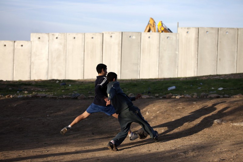 Children playing near the Separation Wall, 22.2.2011