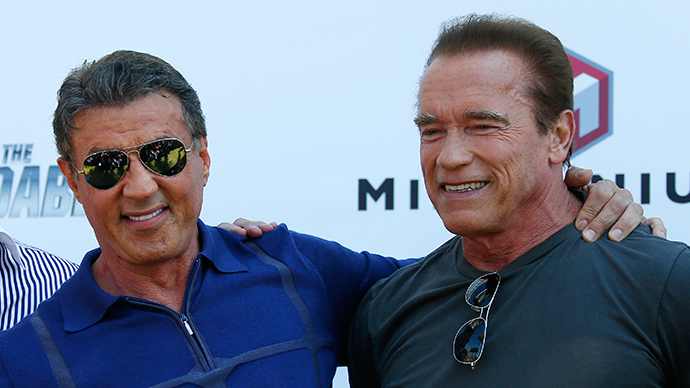 Sylvester Stallone (kiri) dan Arnold Schwarzenegger. Foto: Reuters/Yves Herman